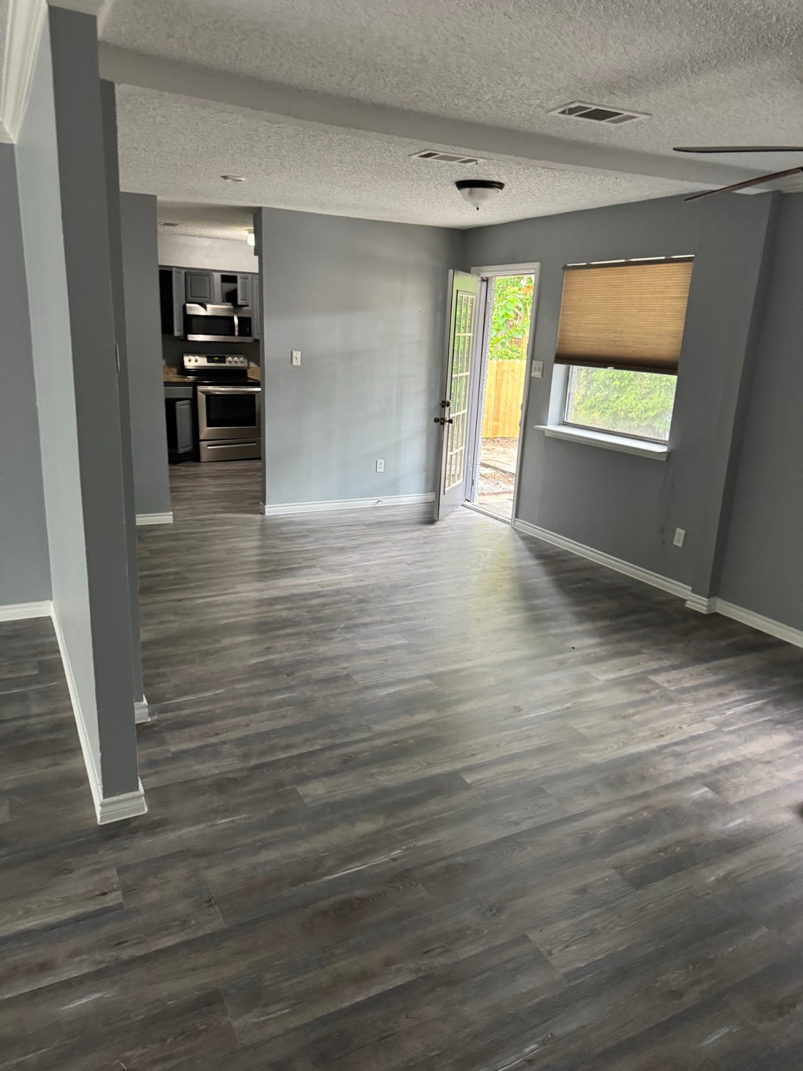 Dining area with French door to backyard